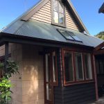 Full exterior cedar and paint restoration on Jacqui's house in Piha